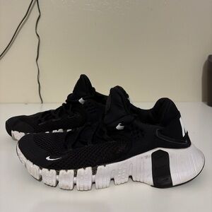 Nike Black Mesh Athletic Shoes with White Accents
